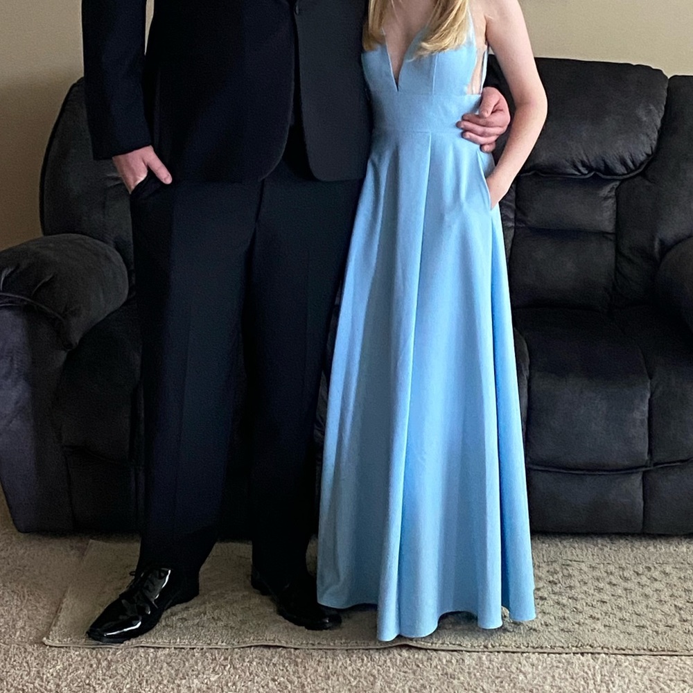 The dress was only tried one for pictures.